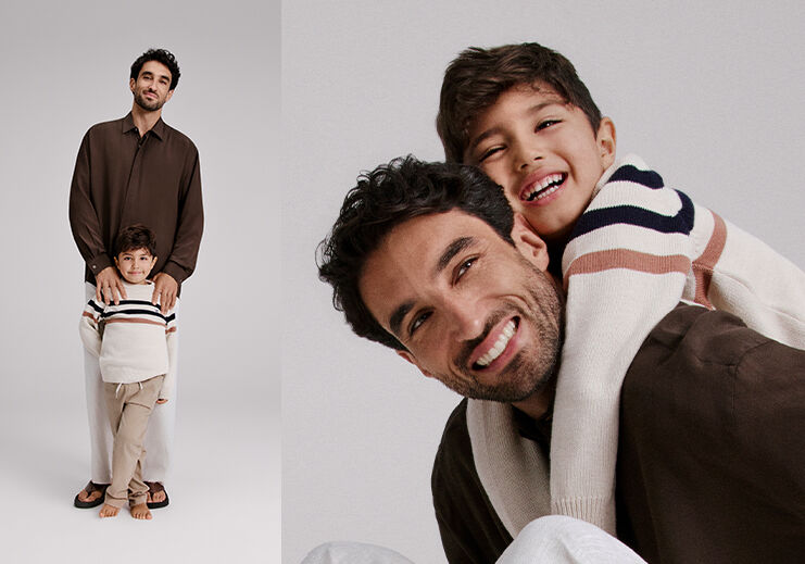 Pai e filho sorrindo juntos em cenário neutro