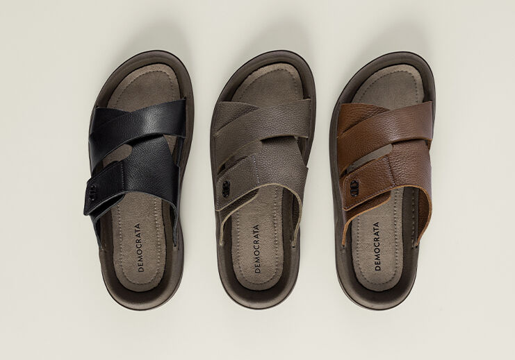 Chinelos em três cores: preto, marrom e caramelo.